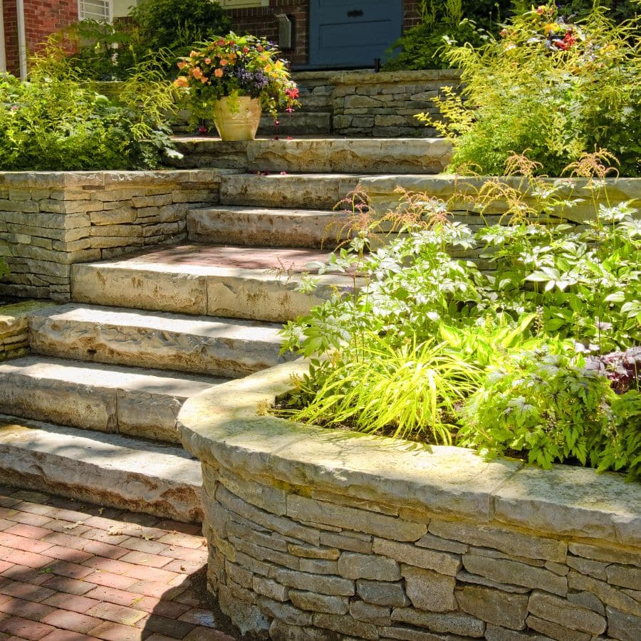 While the primary purpose of a retaining wall is functional, it doesn’t mean we can’t enhance its appearance. 