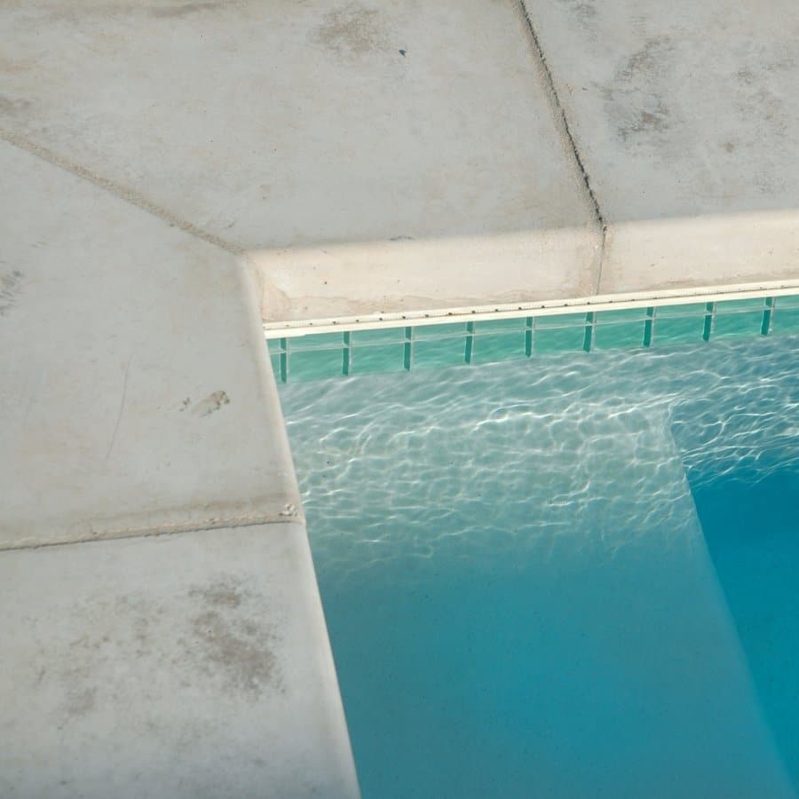 While safety-enhancing finishes are a significant part of BMPC's pool deck construction, we also pay immense attention to integrating robust drainage solutions into the pool deck design.