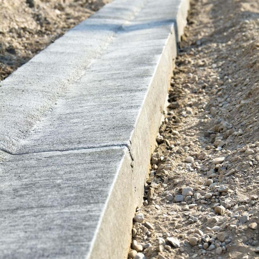 The choice of materials plays a pivotal role in constructing commercial curbs and gutters, greatly impacting the installation's durability, functionality, and aesthetics.